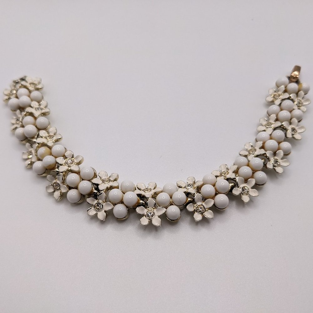 1950s antique bracelet w/ white enamel daisies, w/ crystal centers, and bakelite